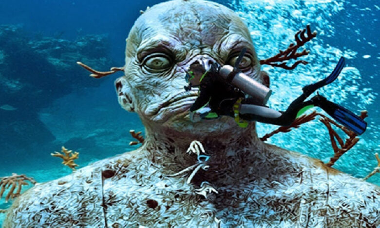 human figure and diver under water