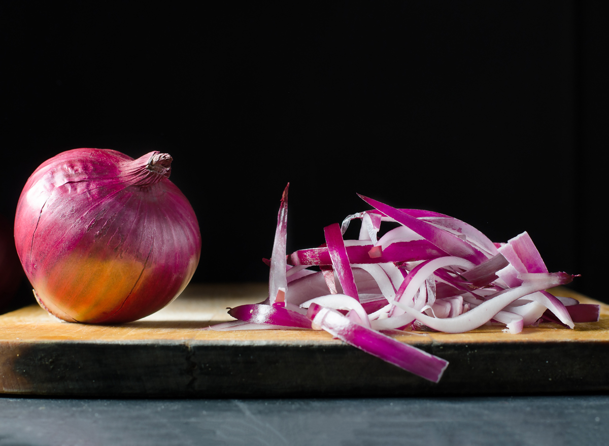 One Major Side Effect of Eating Onions, Say Dietitians — Eat This Not That