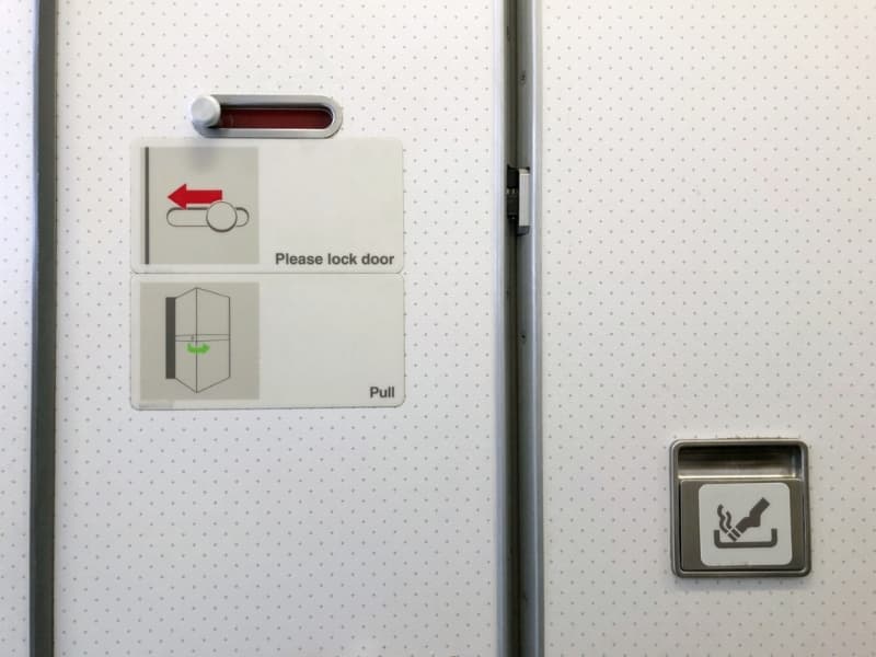 bathroom door in the airplane