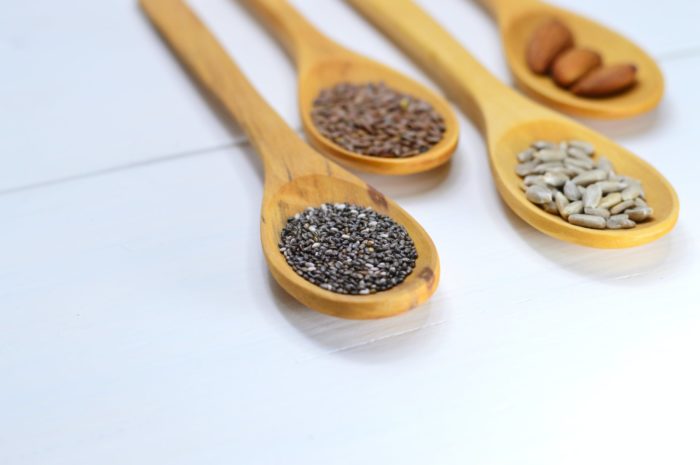 different type of seeds in spoons